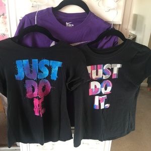 Three Nike" logo shirts for one misses size